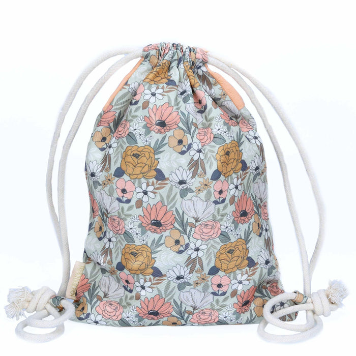 Mochila com orelhas de coelho e padrão de flores